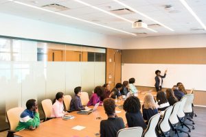 people having meeting inside conference room