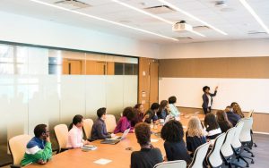 people having meeting inside conference room